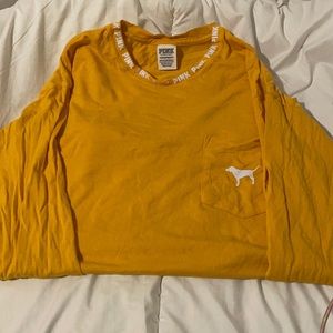 Pink, mustard yellow, white lettering, long sleeve